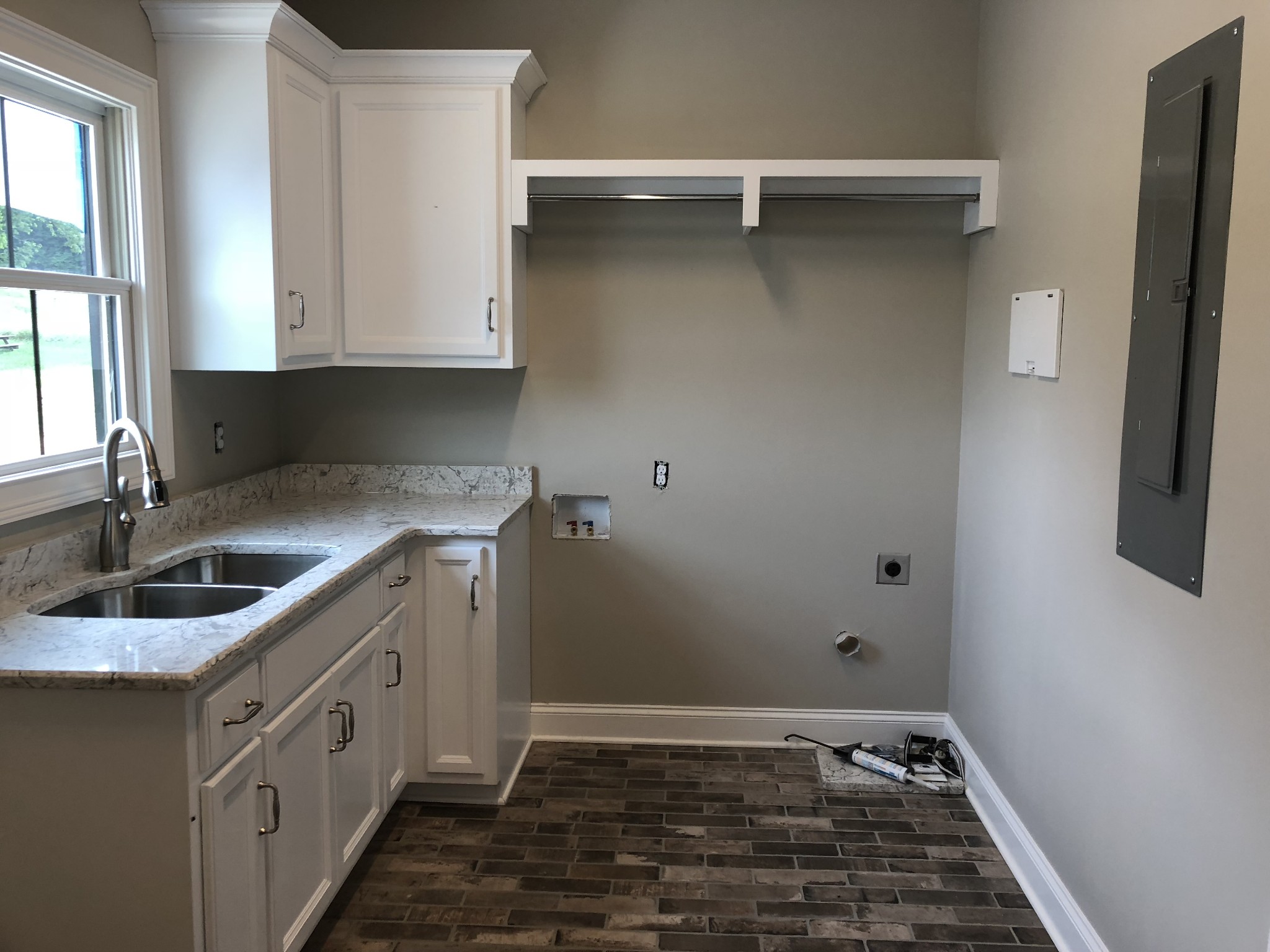1333 County Line Road Watertown, TN 37184 - Photo 10 of 19 a kitchen with a sink and cabinets