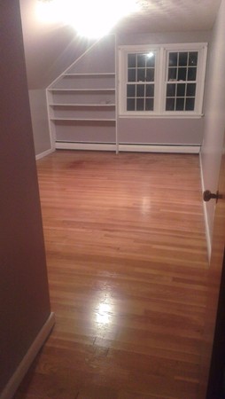 50 Greaney Street Springfield, MA 01104 - Photo 13 of 20 a view of empty room with windows and wardrobe