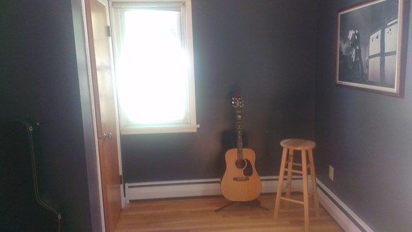 50 Greaney Street Springfield, MA 01104 - Photo 14 of 20 a floor to ceiling window and chair
