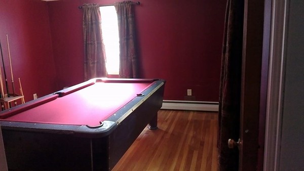 50 Greaney Street Springfield, MA 01104 - Photo 17 of 20 a room with pool table and windows
