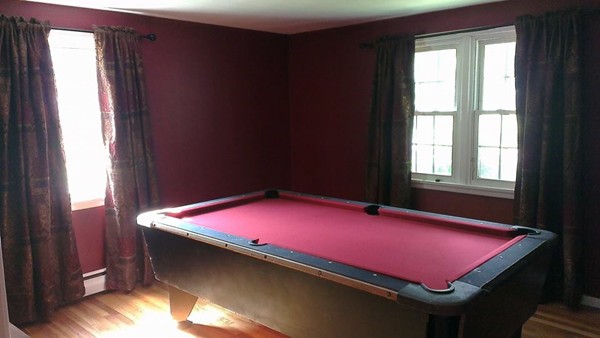 50 Greaney Street Springfield, MA 01104 - Photo 18 of 20 a room with pool table and windows