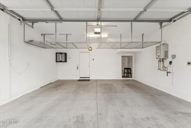 a view of a porch with furniture and floor to ceiling window