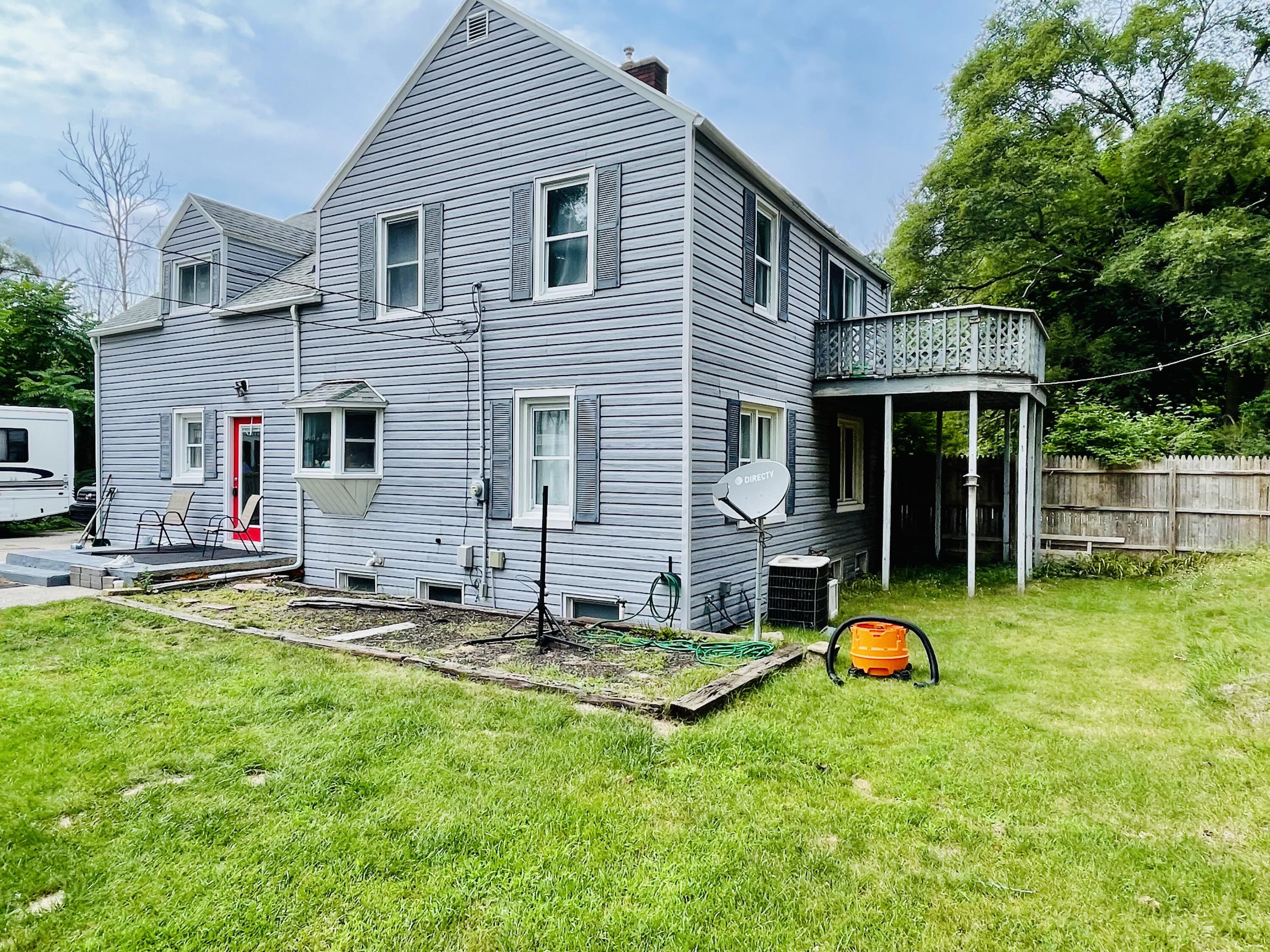 15210 Cleveland Street Spring Lake, MI 49456 - Photo 2 of 34 FullSizeRender