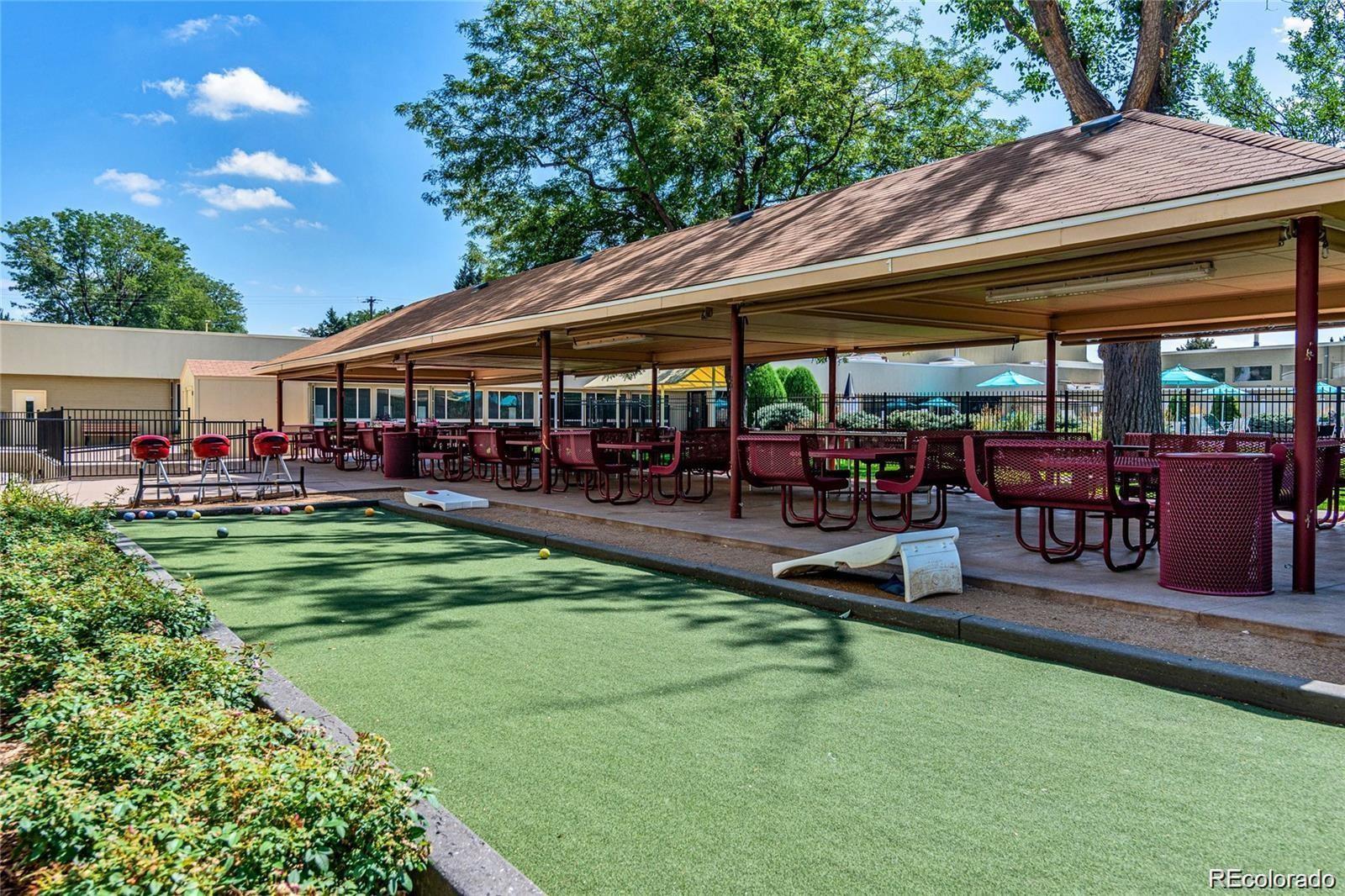 595 South Alton Way, Unit 7B Denver, CO 80247 - Photo 30 of 38 a view of outdoor space yard deck patio and swimming pool