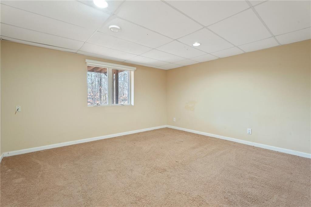 3010 Bluffton Way Roswell, GA 30075 - Photo 19 of 21 an empty room with a windows and closet