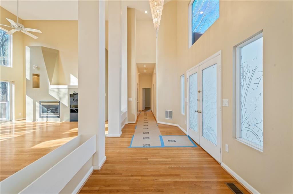3010 Bluffton Way Roswell, GA 30075 - Photo 2 of 21 a view of a bathroom with bathtub and windows
