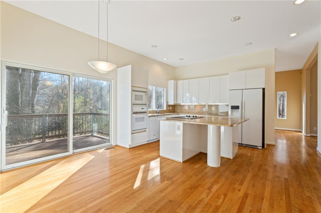 3010 Bluffton Way Roswell, GA 30075 - Photo 5 of 21 a view of kitchen with wooden floor