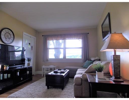 26 Glenwood Road Rutland, MA 01543 - Photo 11 of 29 a living room with furniture and a flat screen tv