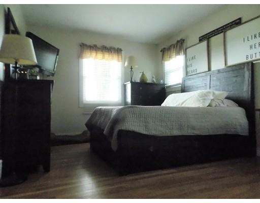 26 Glenwood Road Rutland, MA 01543 - Photo 18 of 29 a bedroom with a bed dresser and a window
