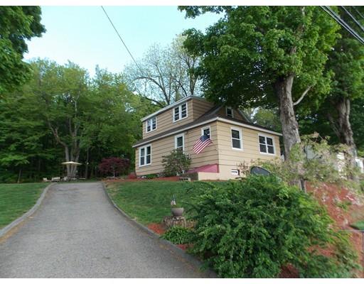 26 Glenwood Road Rutland, MA 01543 - Photo 2 of 29 a front view of a house with a yard