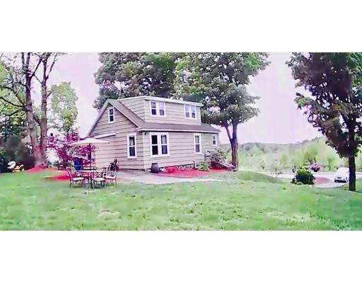 26 Glenwood Road Rutland, MA 01543 - Photo 7 of 29 a view of a house with a yard and sitting area