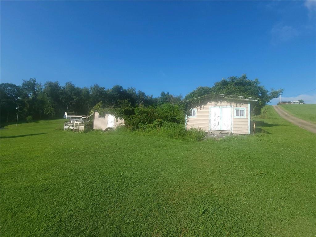 825 McClane Farm Road Washington, PA 15301 - Photo 2 of 26 a lake view with a big yard