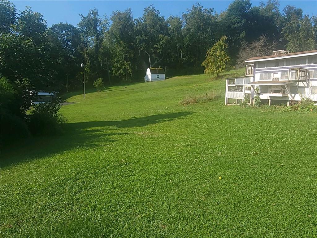 825 McClane Farm Road Washington, PA 15301 - Photo 4 of 26 a view of a table and chairs in the garden