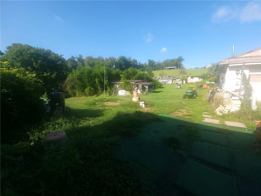 825 McClane Farm Road Washington, PA 15301 - Photo 8 of 26 a view of a big yard with swimming pool and green space