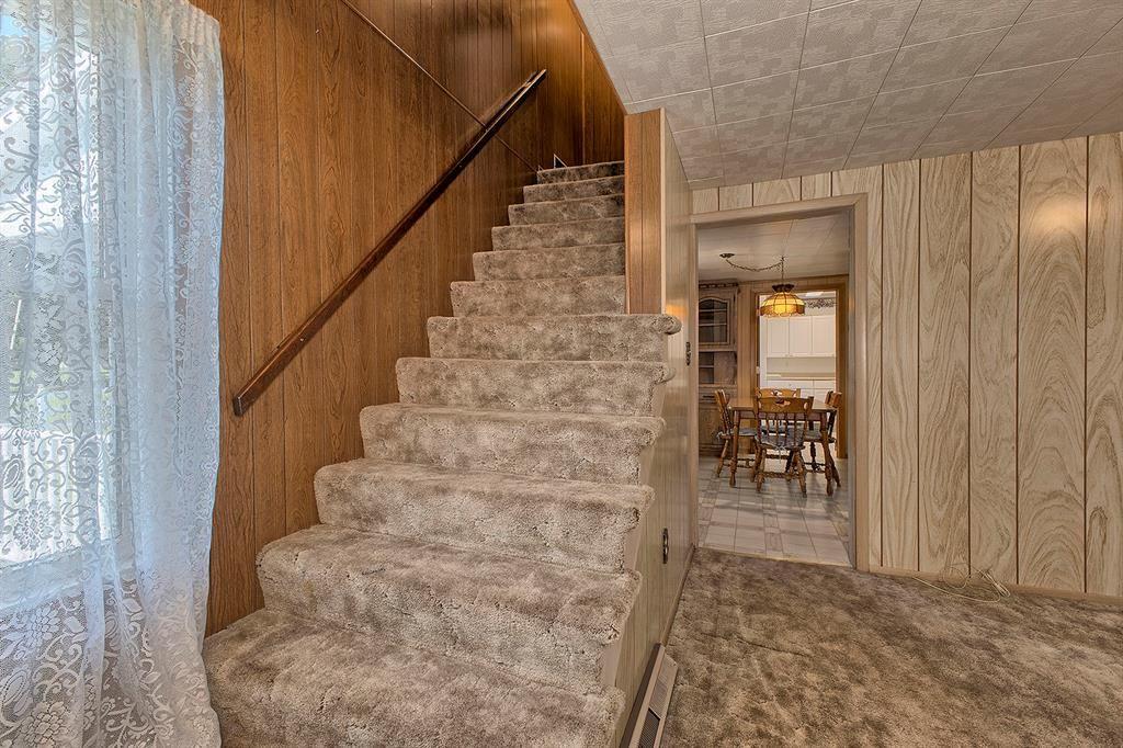 139 Holly Place Road Mount Pleasant, PA 15666 - Photo 16 of 37 Living Room Stairs to 2nd Story