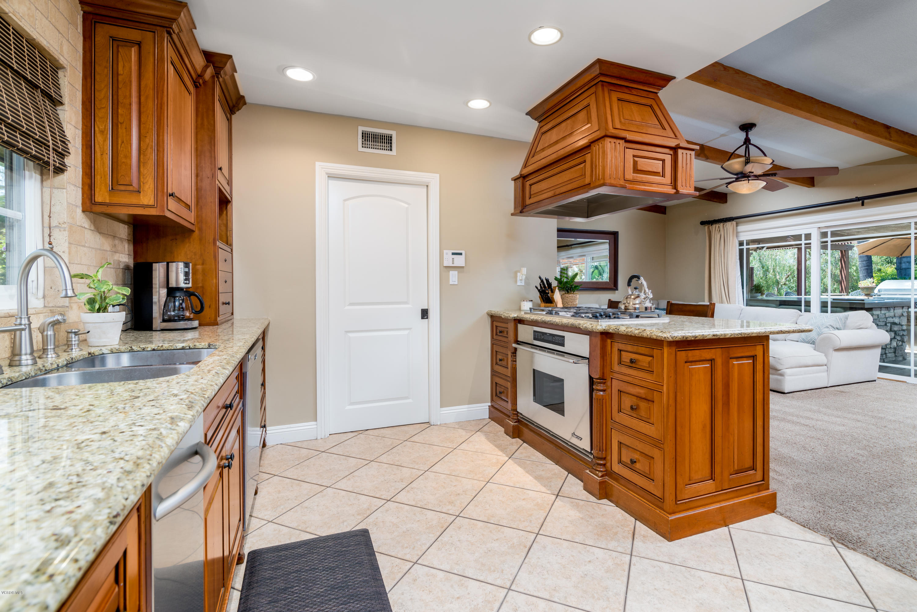 3327 Rancho Rio Bonita Road Covina, CA 91724 - Photo 15 of 58 a kitchen with stainless steel appliances granite countertop a stove and a sink