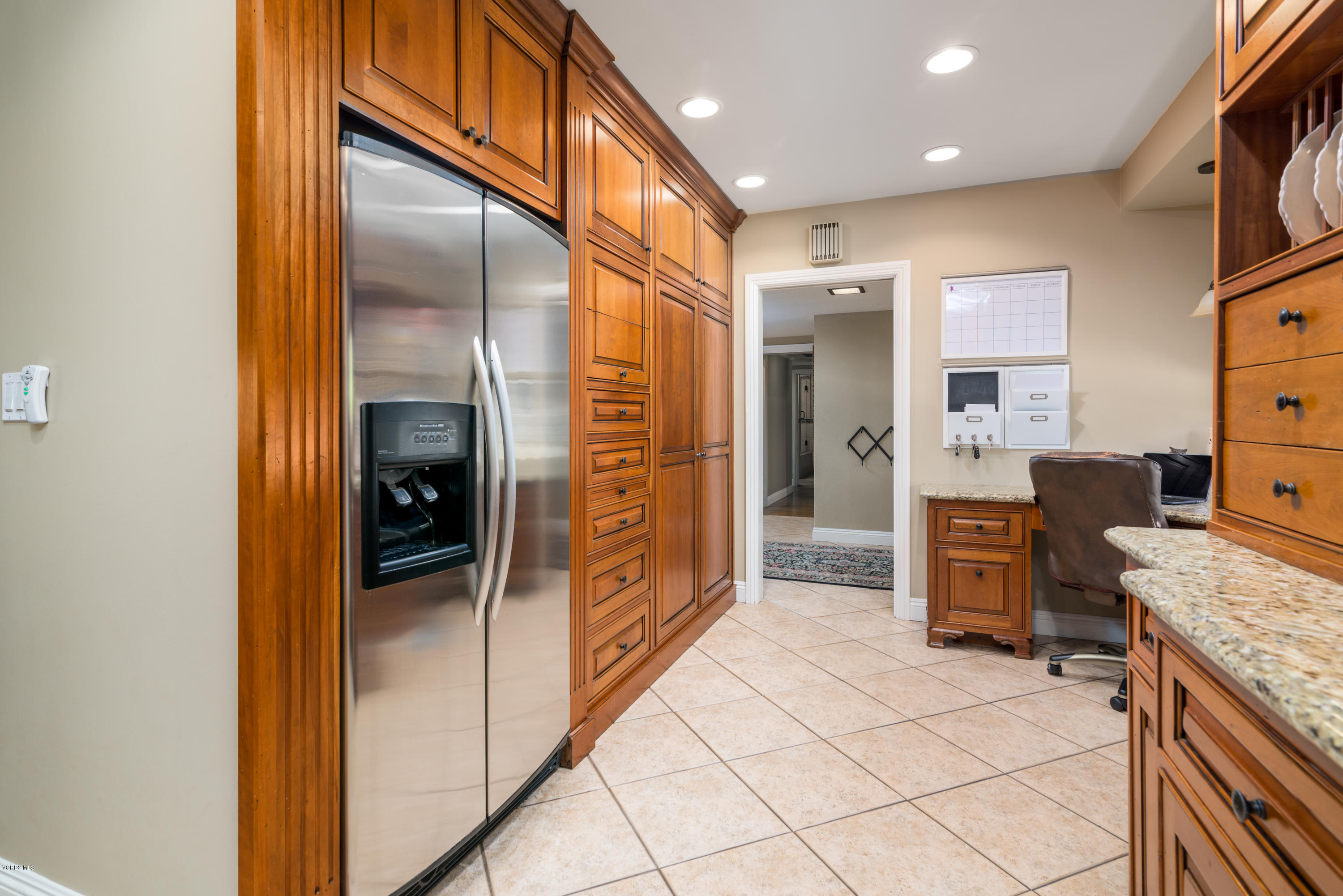 3327 Rancho Rio Bonita Road Covina, CA 91724 - Photo 16 of 58 a bathroom with a granite countertop sink and washing machine