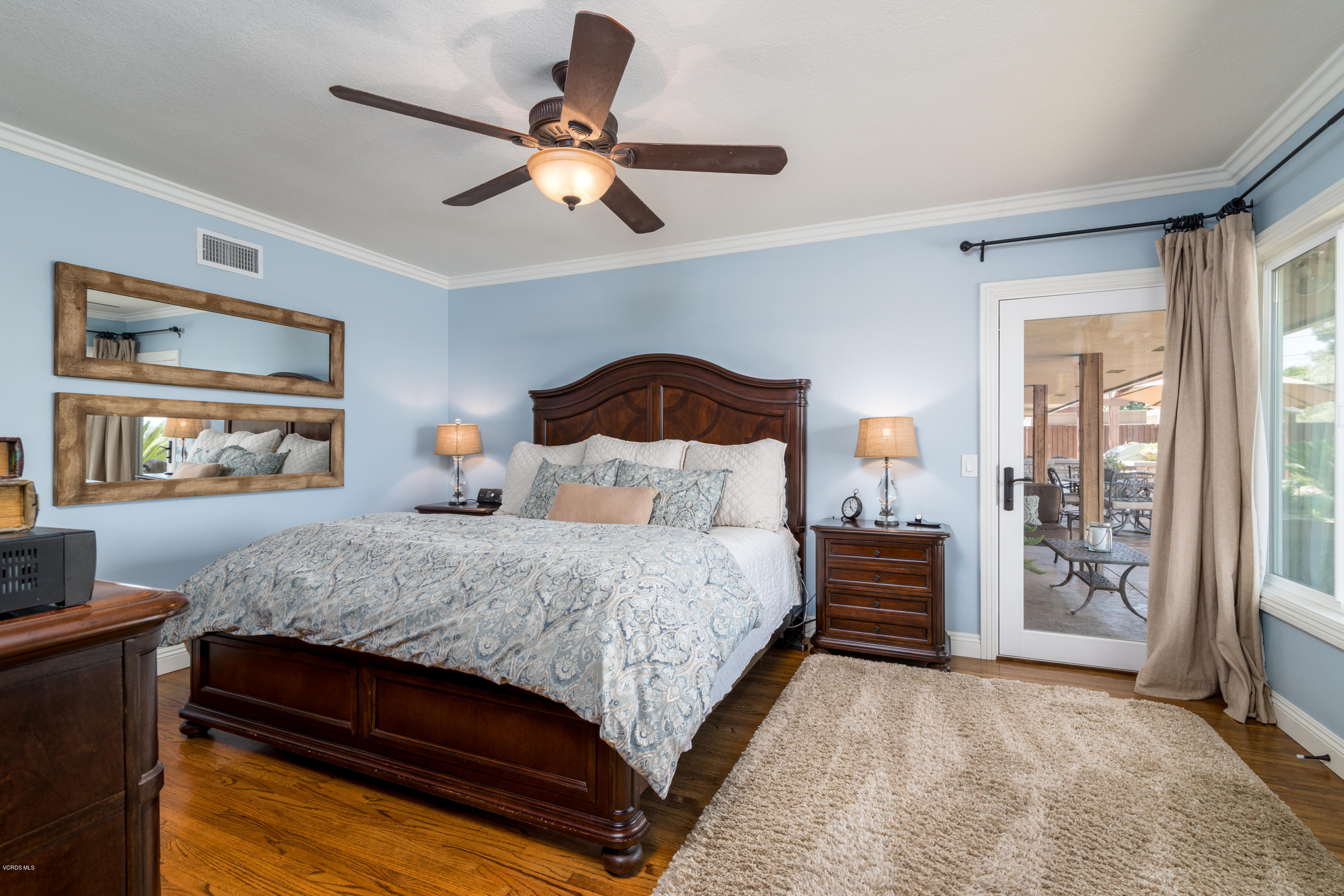 3327 Rancho Rio Bonita Road Covina, CA 91724 - Photo 19 of 58 a bedroom with a large bed and a chandelier
