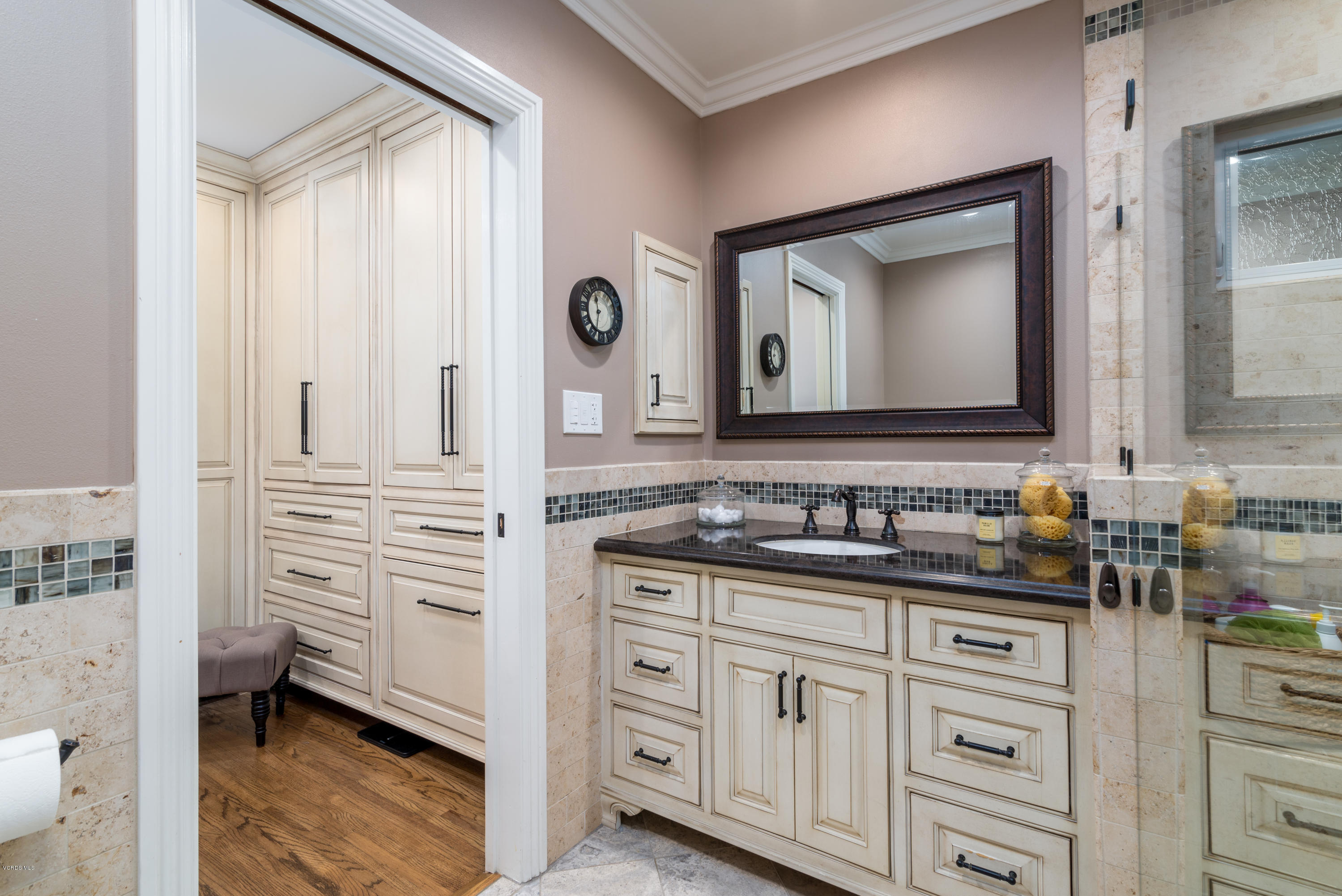 3327 Rancho Rio Bonita Road Covina, CA 91724 - Photo 24 of 58 a bathroom with a granite countertop sink vanity mirror and a