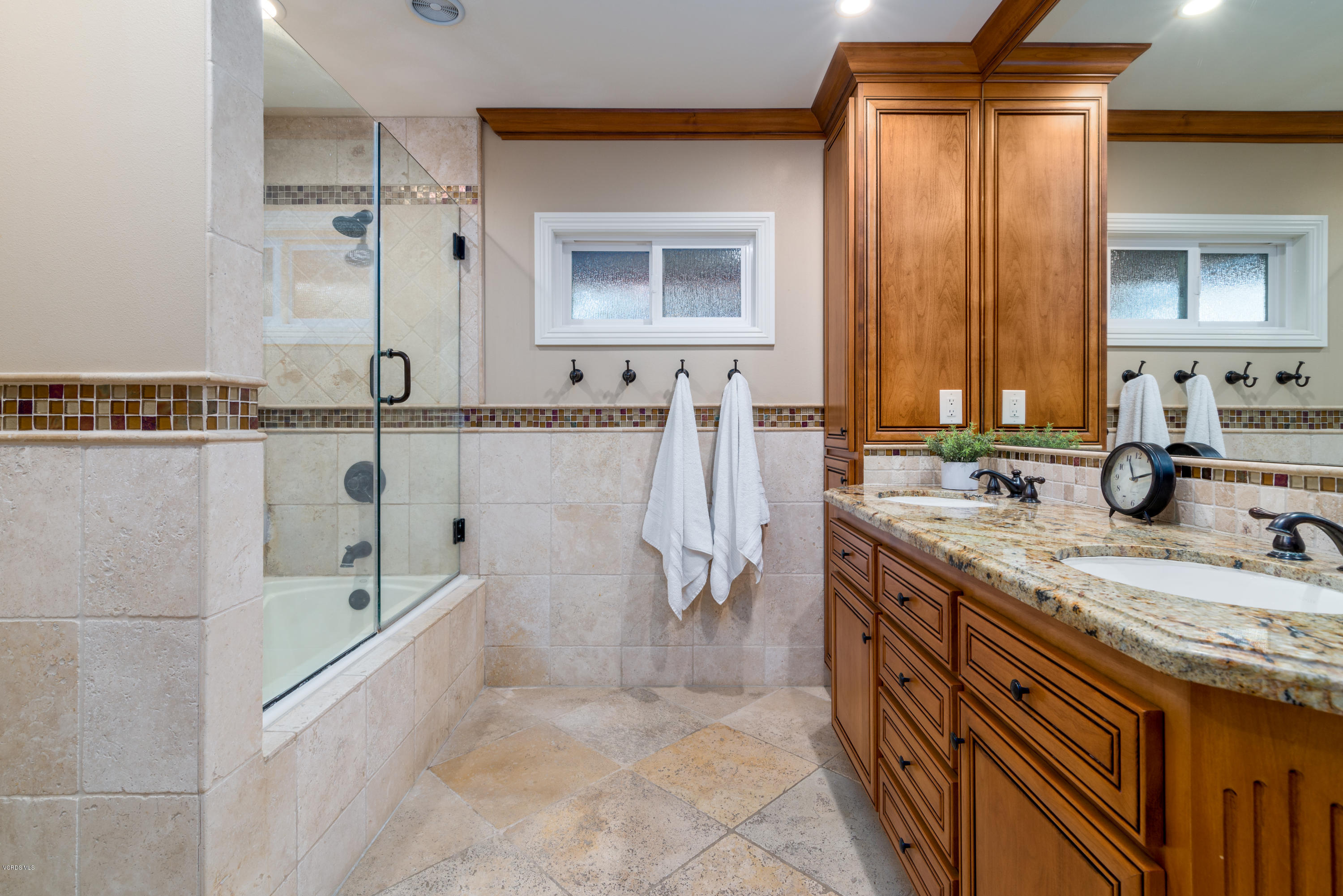3327 Rancho Rio Bonita Road Covina, CA 91724 - Photo 28 of 58 a bathroom with a granite countertop sink a mirror and shower