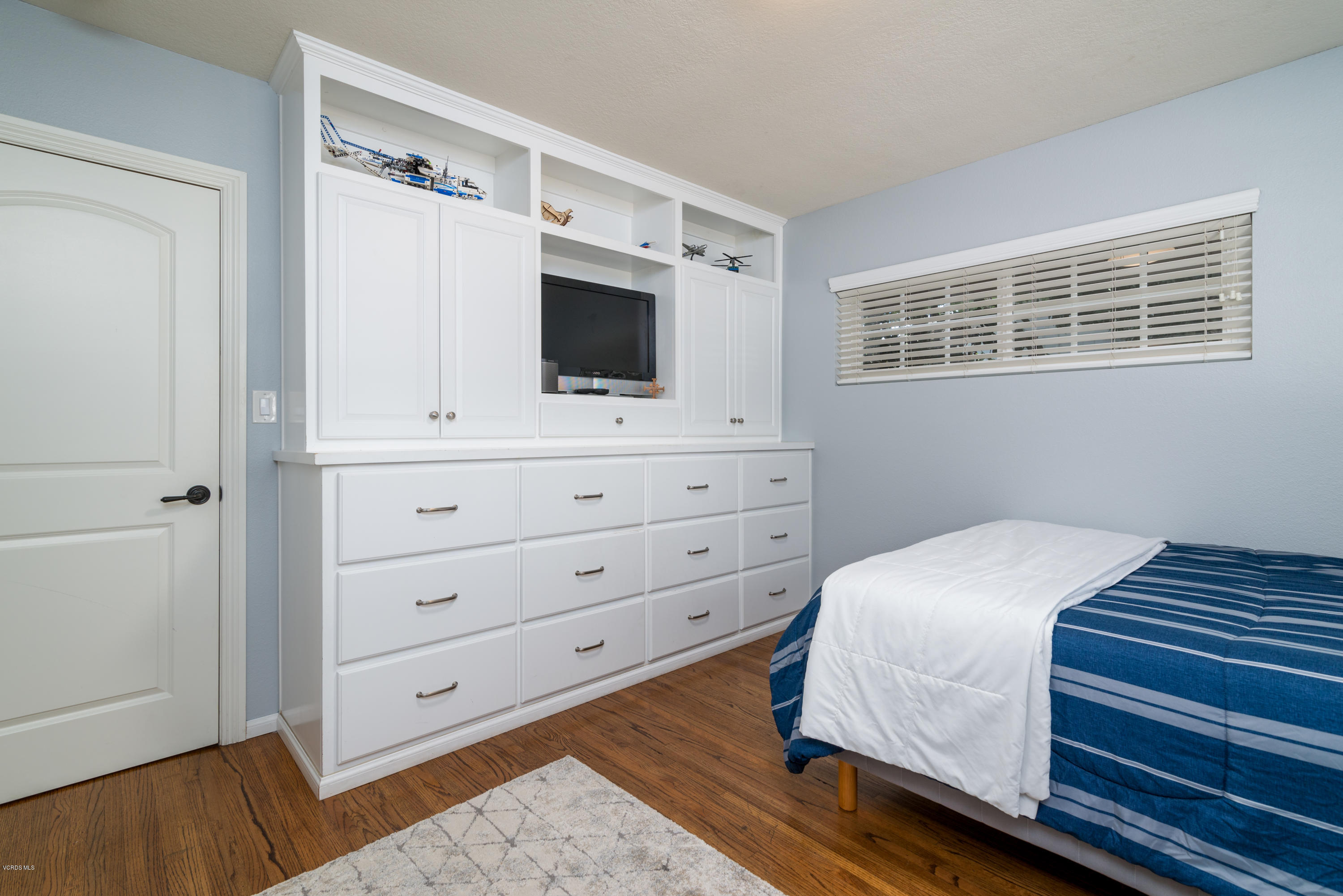 3327 Rancho Rio Bonita Road Covina, CA 91724 - Photo 32 of 58 a bedroom with a bed and a television