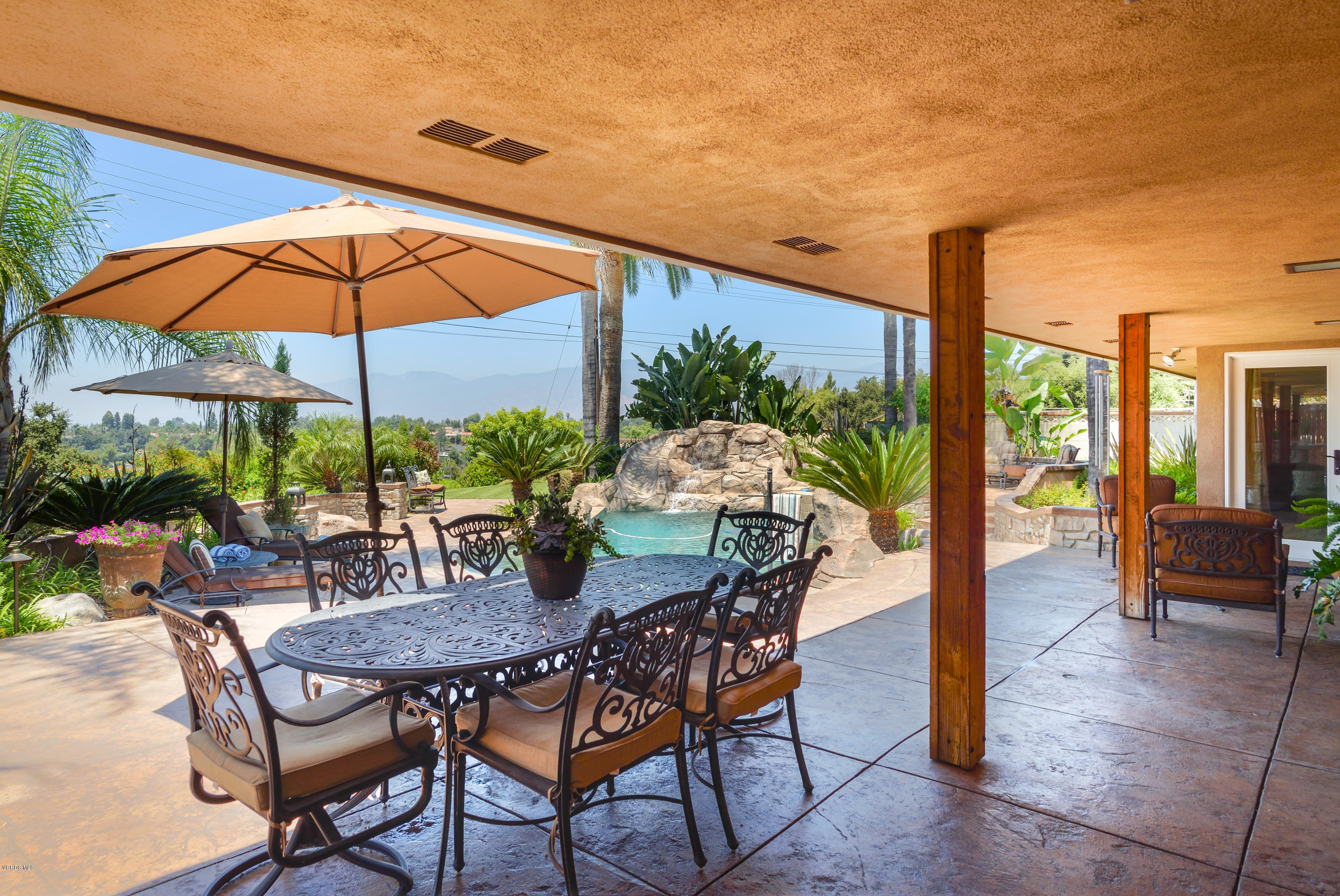 3327 Rancho Rio Bonita Road Covina, CA 91724 - Photo 35 of 58 a view of an outdoor space with furniture and umbrella