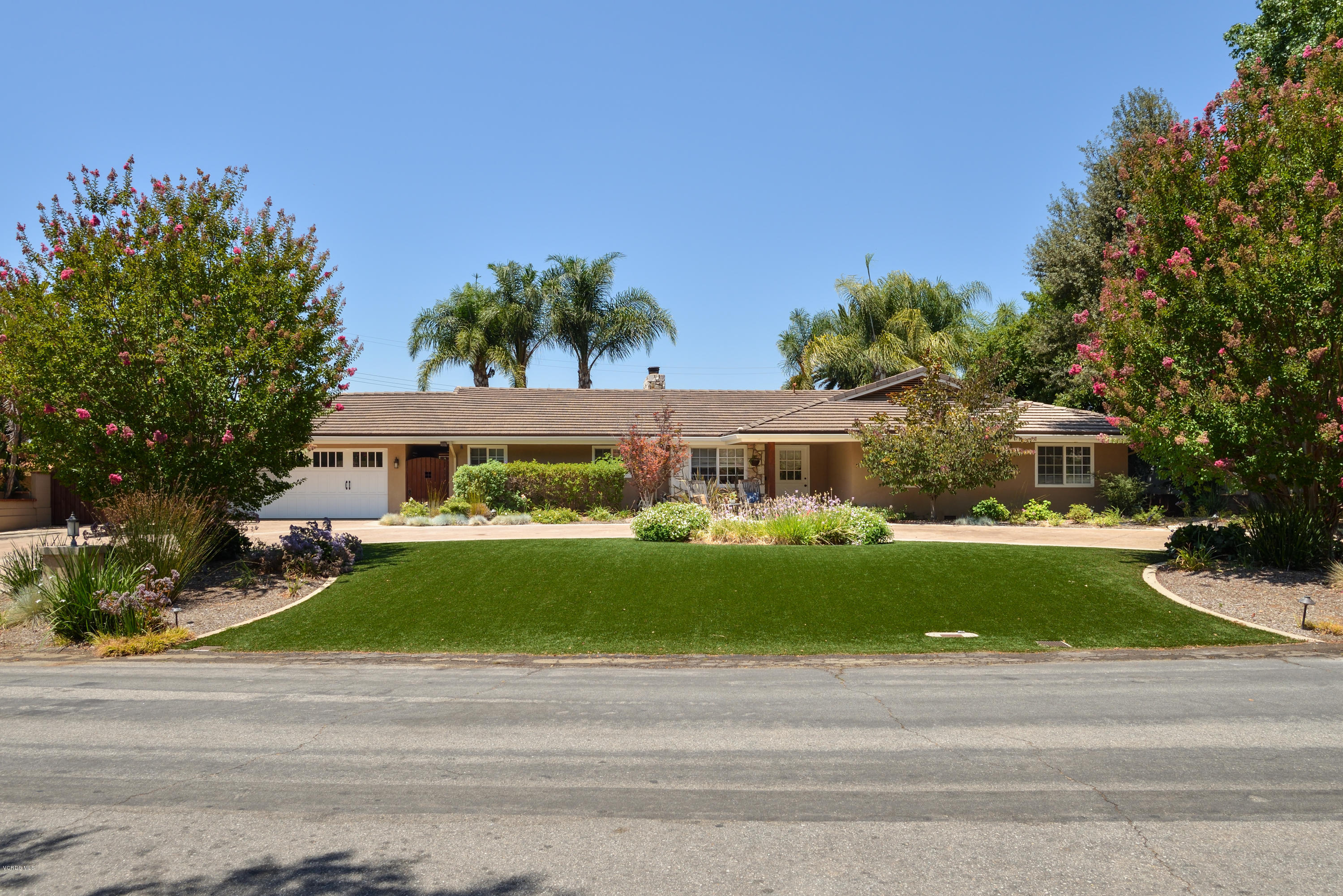 3327 Rancho Rio Bonita Road Covina, CA 91724 - Photo 4 of 58 a front view of a house with a garden
