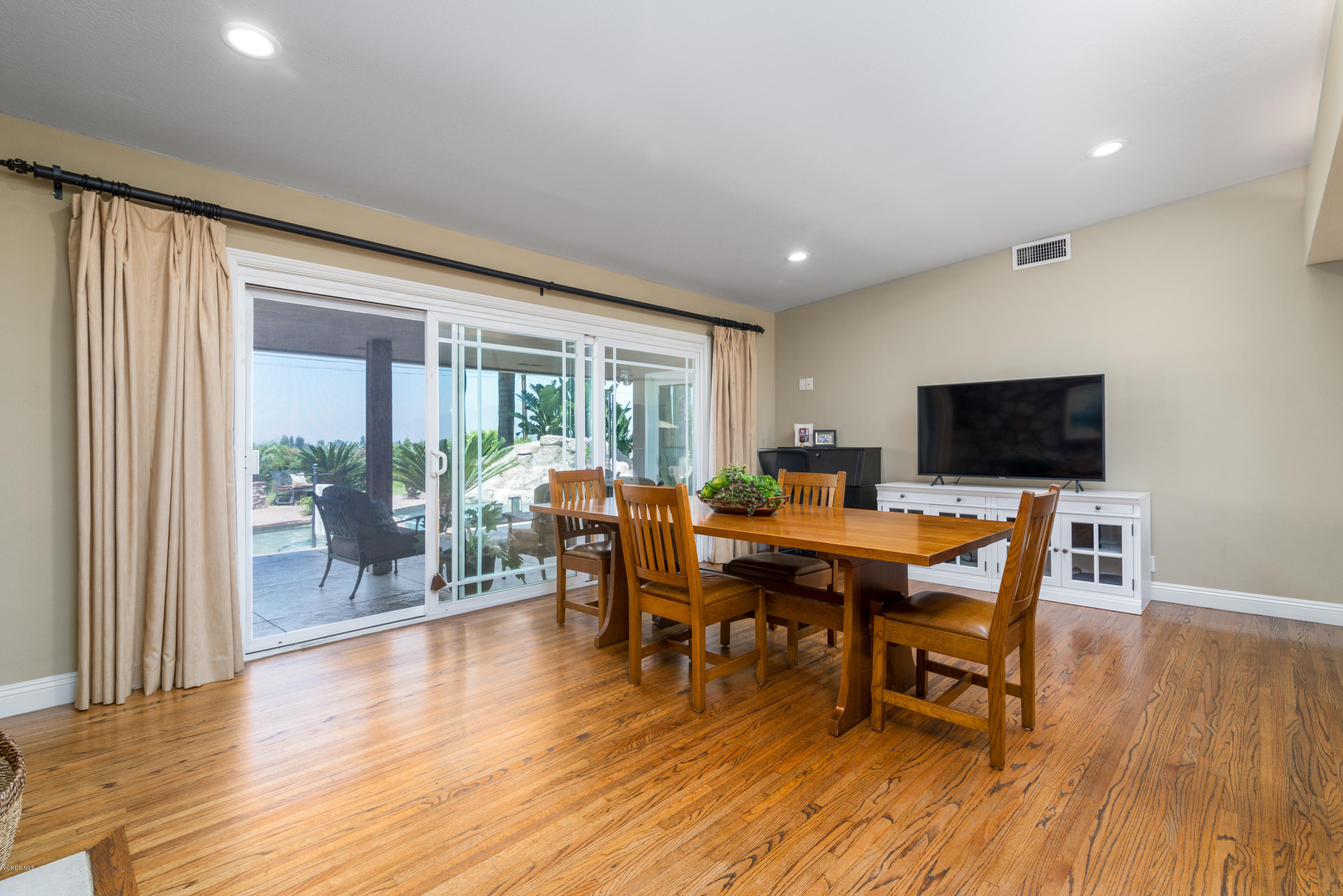3327 Rancho Rio Bonita Road Covina, CA 91724 - Photo 9 of 58 a view of a dining room with furniture window and wooden floor