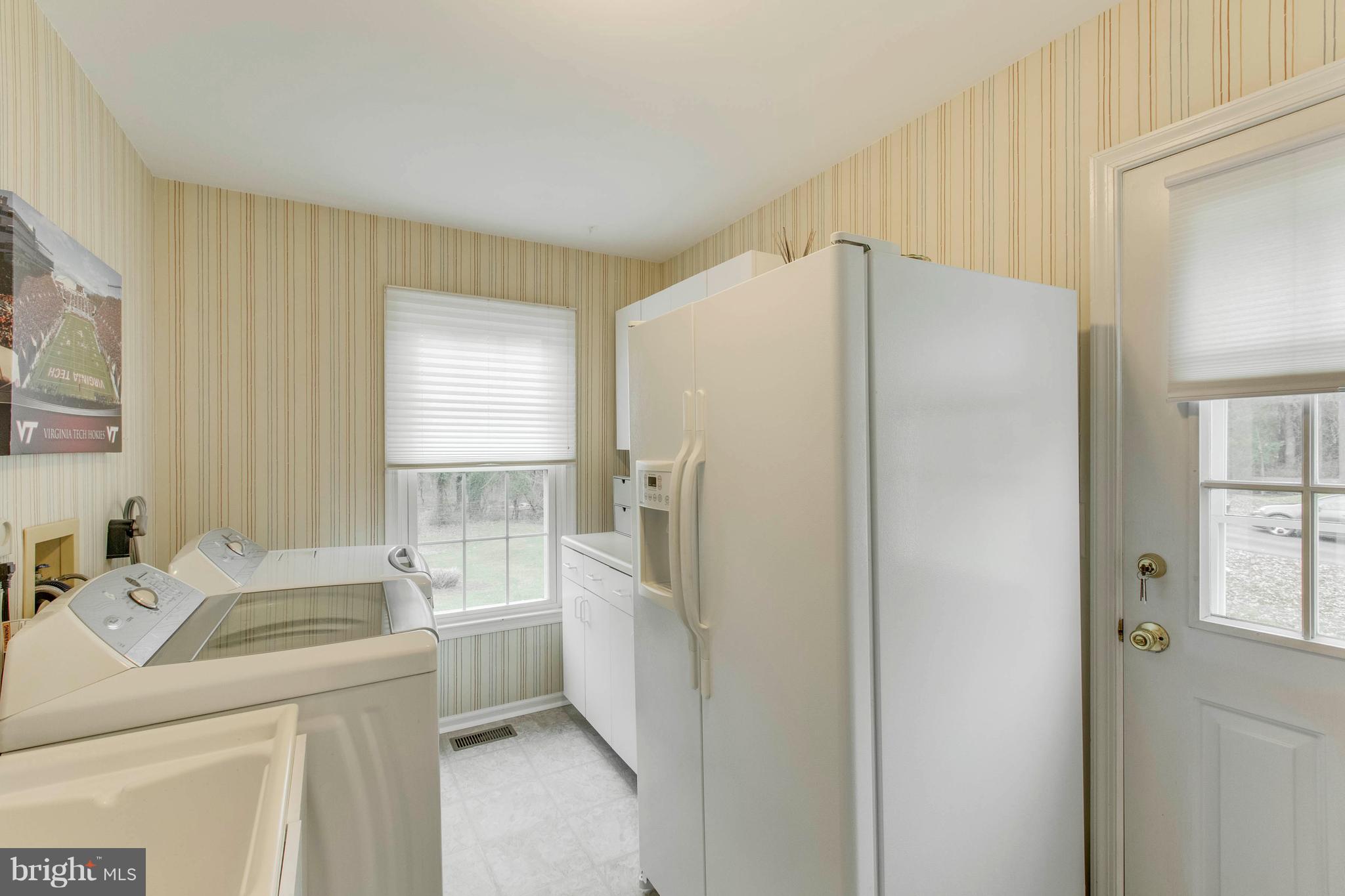 145 Peyton Road Sterling, VA 20165 - Photo 25 of 54 1st floor laundry room