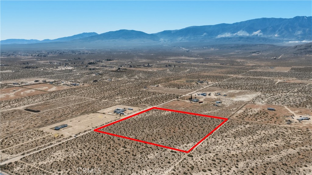 10384 Locust Road Lucerne Valley, CA 92356 - Photo 4 of 13 a view of an outdoor space with mountain view