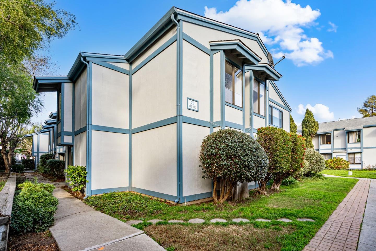 1925 46th Avenue, Unit 172 Capitola, CA 95010 - Photo 16 of 26 a front view of a house with garden
