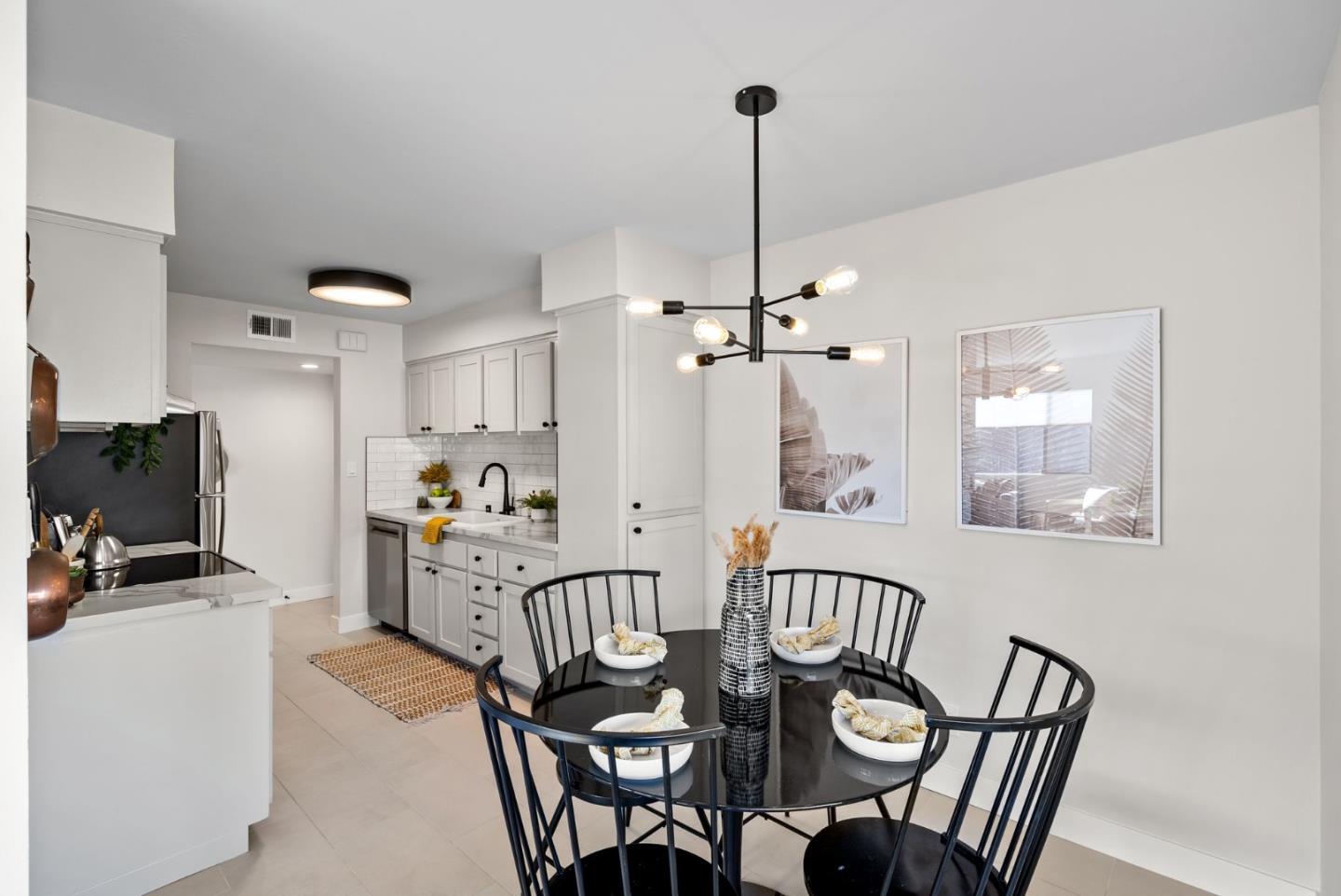 1925 46th Avenue, Unit 172 Capitola, CA 95010 - Photo 5 of 26 a view of a dining room with furniture