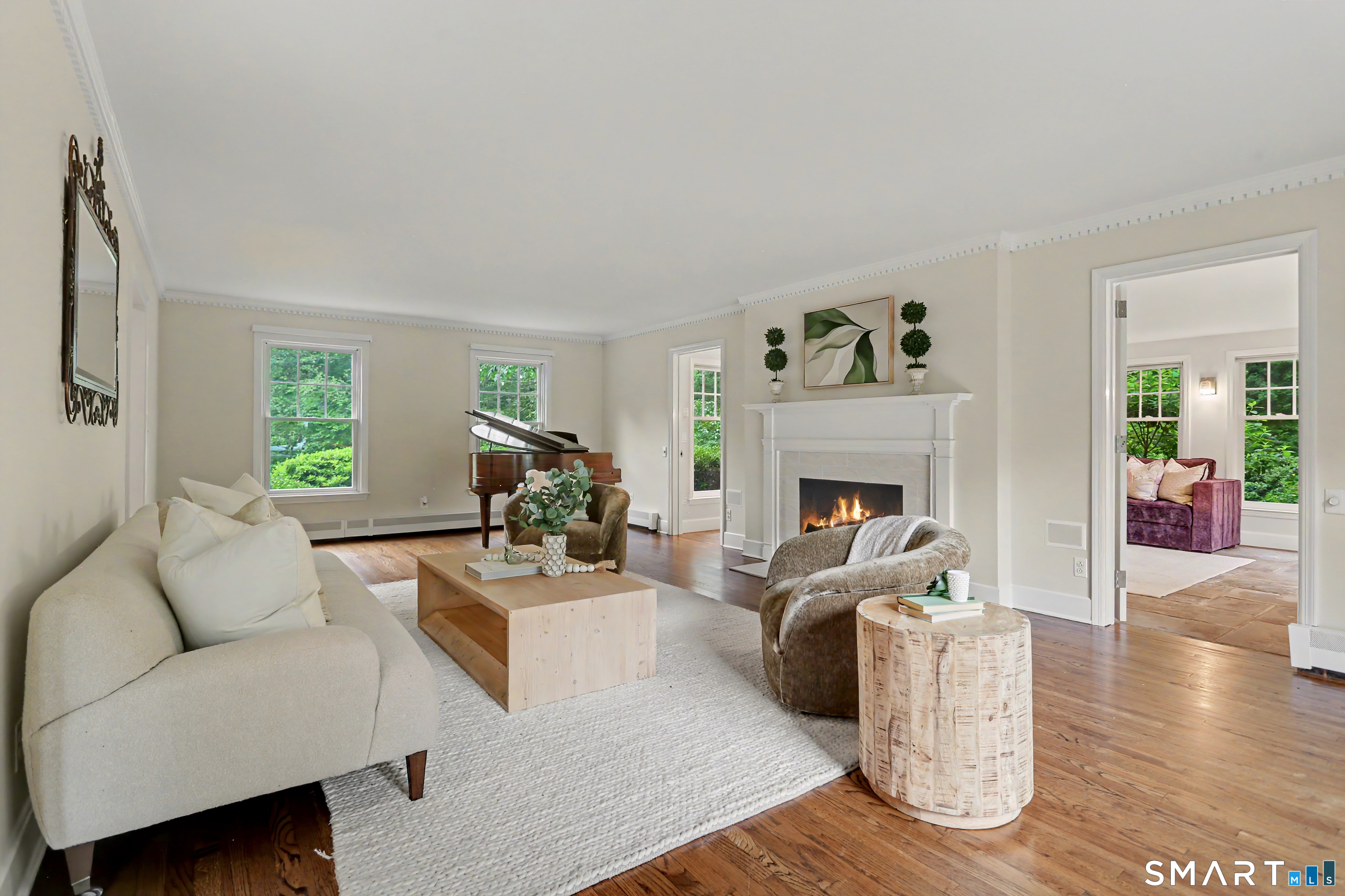 108 Logan Road New Canaan, CT 06840 - Photo 4 of 40 a living room with furniture and a fireplace