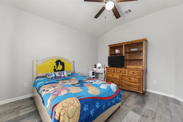 a bathroom with a double vanity sink and mirror with shower