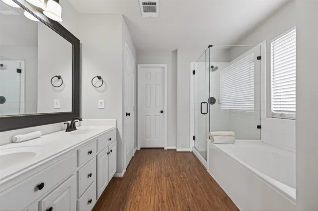 a view of a patio with couches chairs and a fire pit