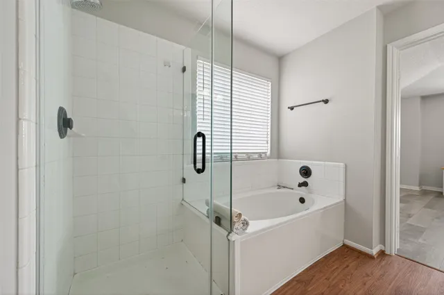 a view of a swimming pool with a house