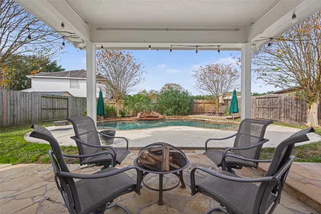 a front view of a house with a yard and porch
