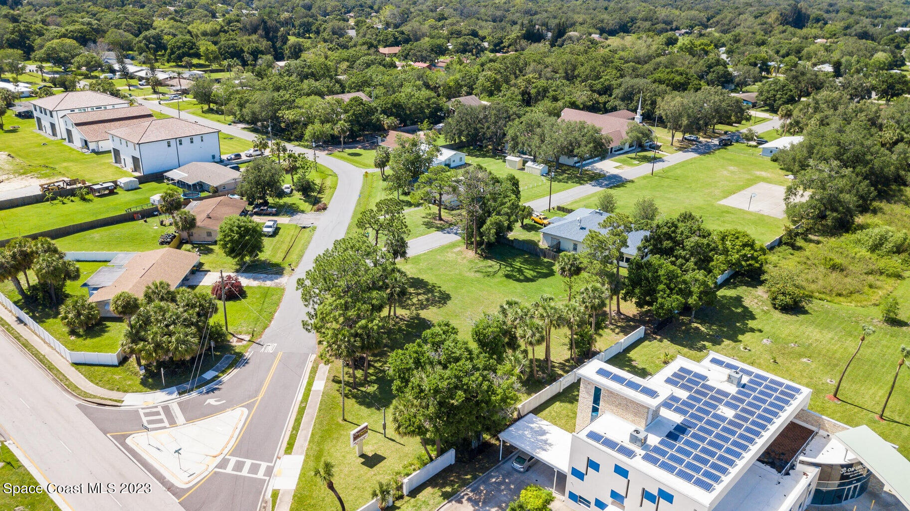 0 Unknown Drive Melbourne, FL 32935 - Photo 8 of 8 an aerial view of residential house with swimming pool and green space