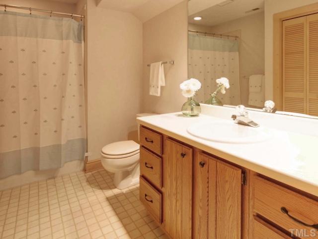 1304 Velvet Court Raleigh, NC 27614 - Photo 10 of 12 Private bath on second floor is convenient to fourth bedroom. Unbelievable walk-in storage spaces on this floor.
