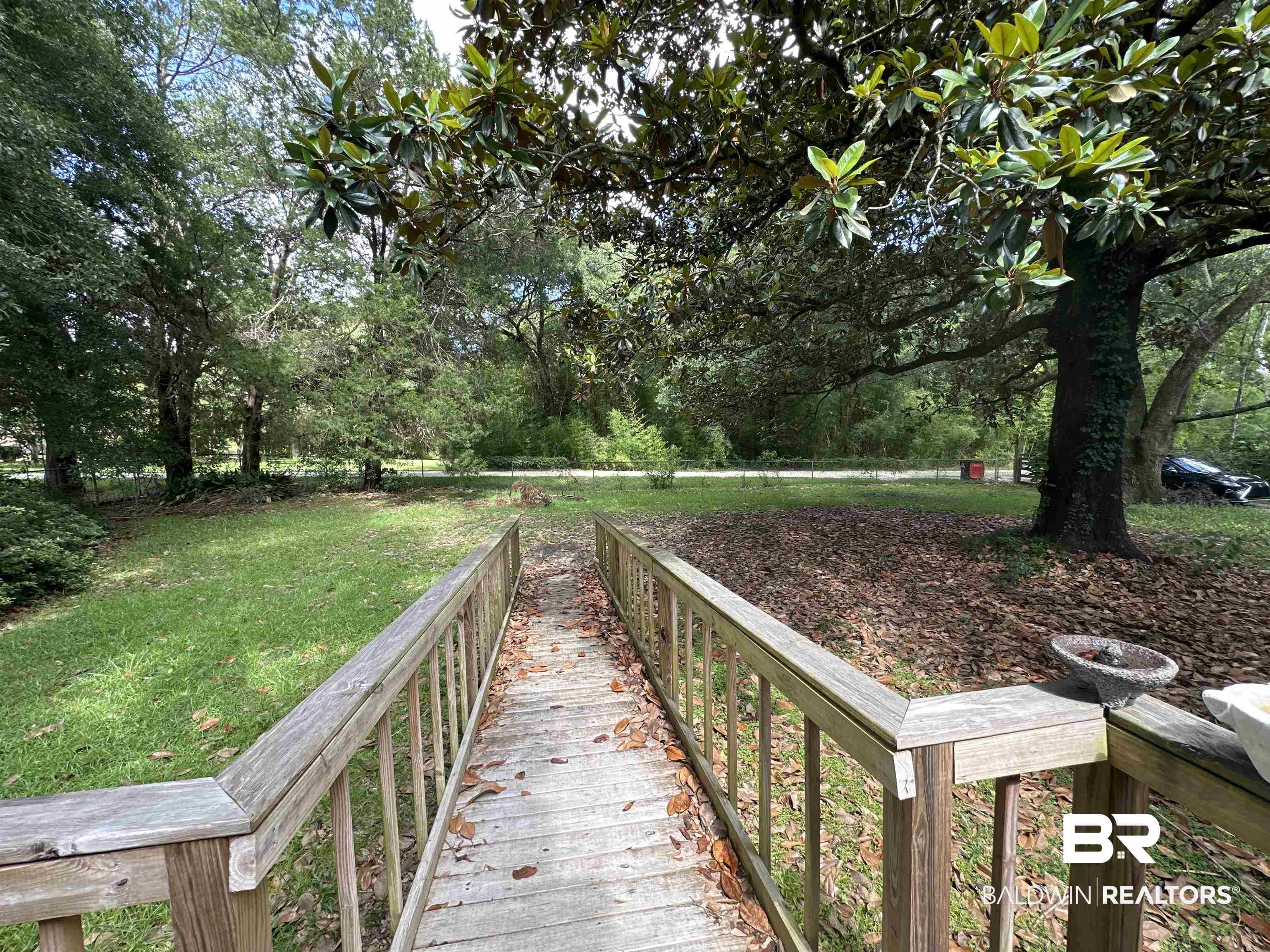 1850 Repoll Drive Mobile, AL 36695 - Photo 3 of 26 Exterior space featuring a lawn