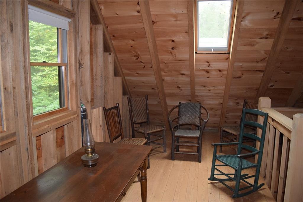 572 Sys Road Lakeville, ME 04487 - Photo 20 of 35 Loft area lake side with skylights...