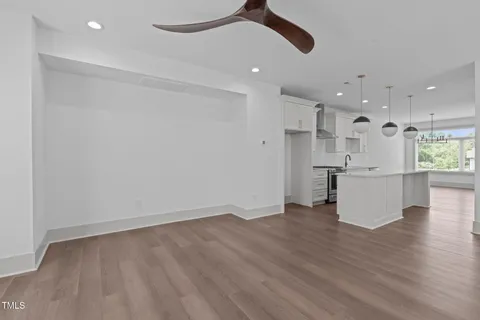 a view of kitchen with wooden floor