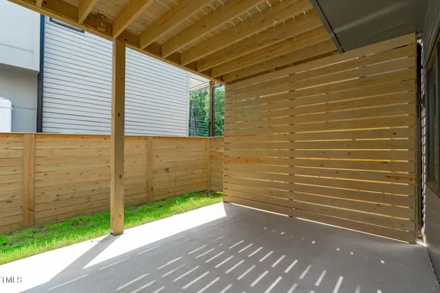 a front view of a house with a backyard