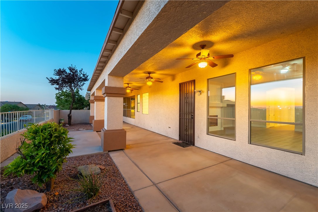 379 Marlin Cove Road Henderson, NV 89012 - Photo 5 of 22 Fenced backyard featuring ceiling fan and a patio