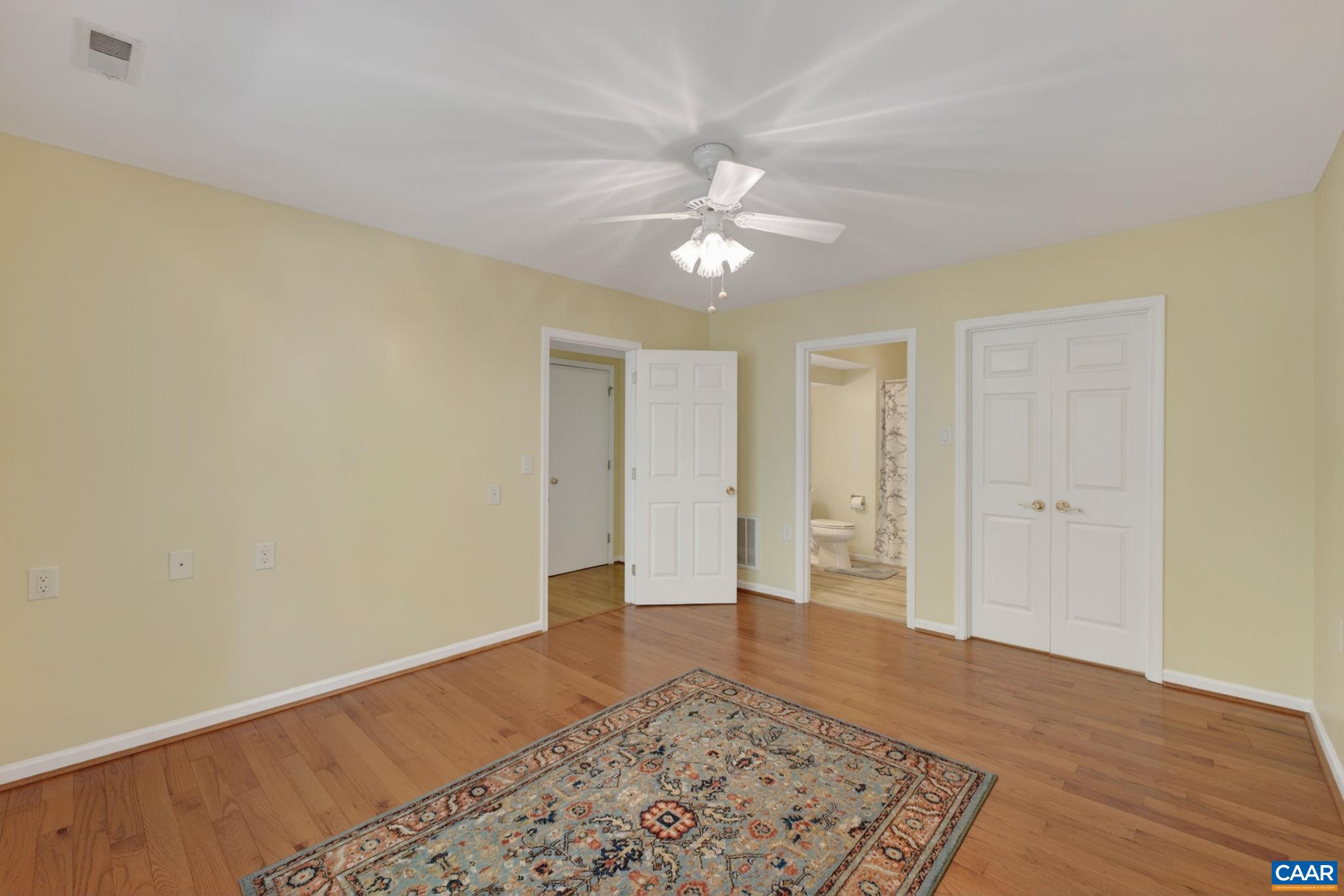 590 Mockingbird Way Charlottesville, VA 22901 - Photo 30 of 43 wooden floor in an empty room with a workspace