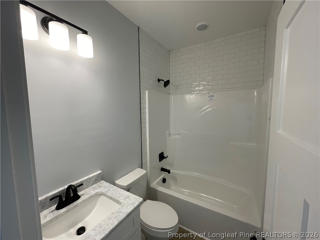 1075 Purdie-Hall Road Tar Heel, NC 28392 - Photo 22 of 28 a bathroom with a sink toilet and shower