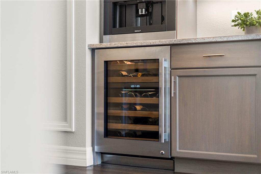 4605 Azalea Drive Naples, FL 34119 - Photo 39 of 50 a view of a hallway with washer and dryer