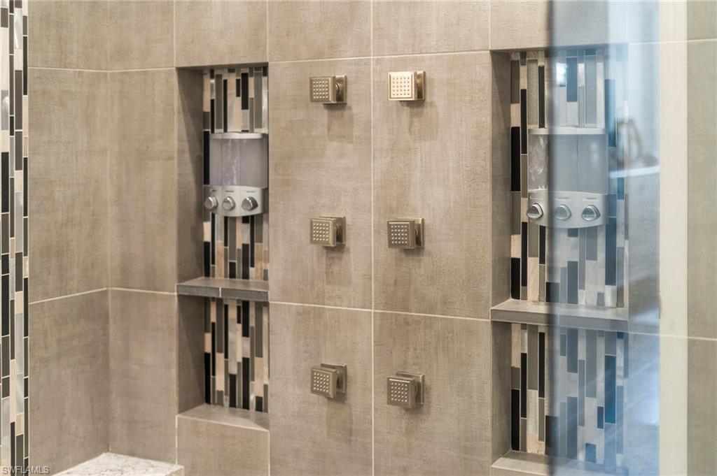 4605 Azalea Drive Naples, FL 34119 - Photo 40 of 50 a bathroom with a shower