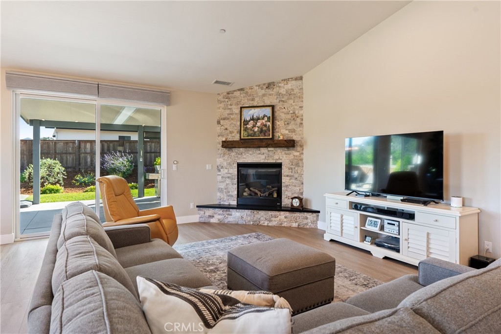 8550 El Corte Road Atascadero, CA 93422 - Photo 14 of 72 a living room with furniture and a flat screen tv