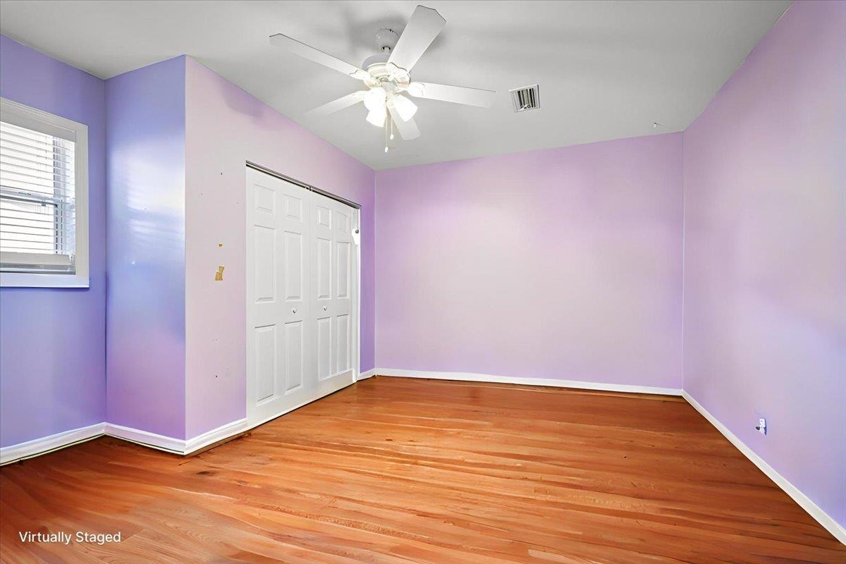 979 Altara Avenue St. Augustine, FL 32086 - Photo 19 of 27 wooden floor in an empty room